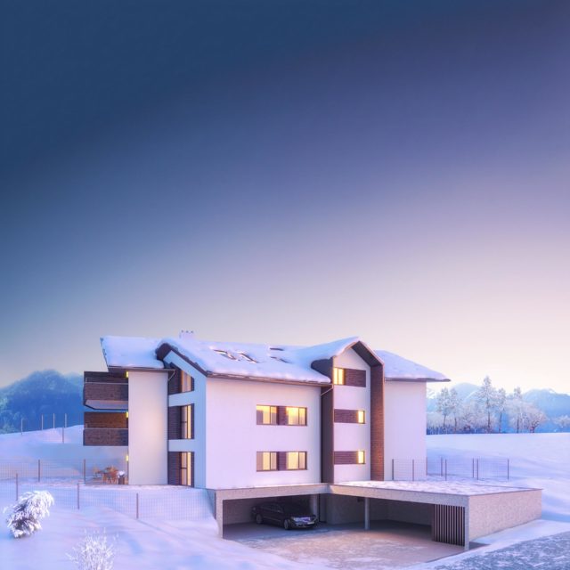 Im Mehrfamilienwohnhaus von Blaupause Immobilien können die Bewohner vom angrenzenden Skigebiet mit den Skier bis zu ihrer Haustüre fahren